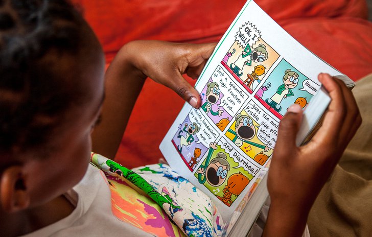 Boy reading a comic