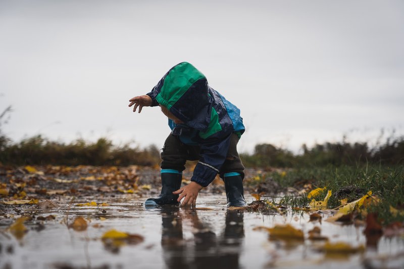 baby in puddle